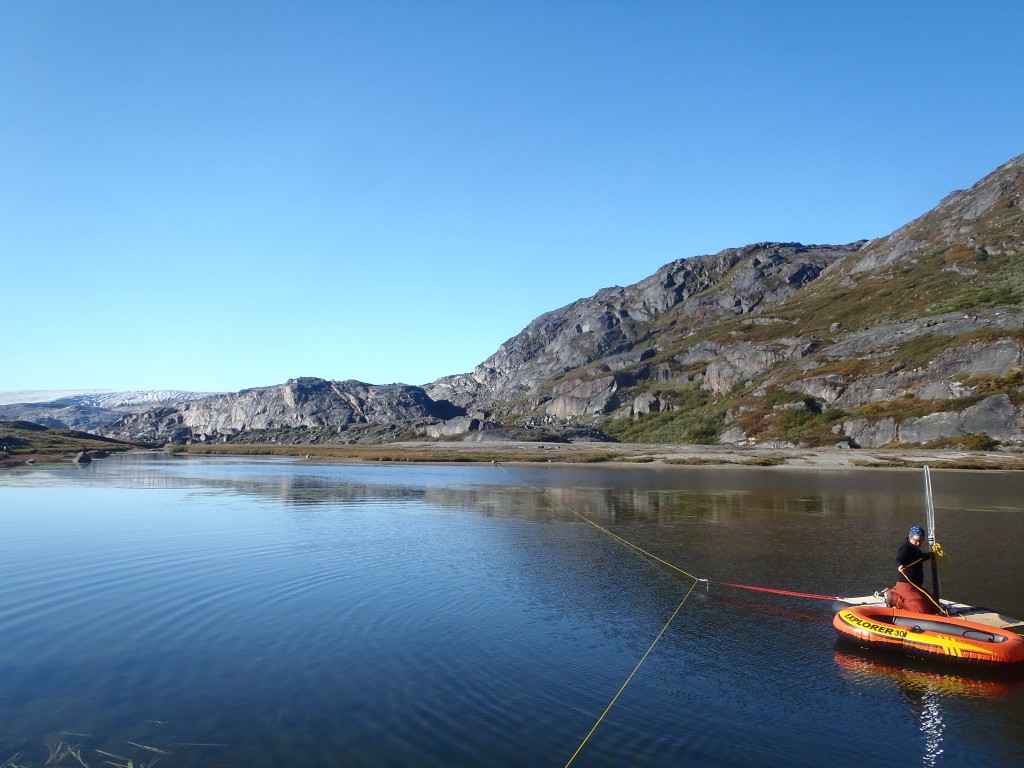 Gaylen Sinclair on the lake coring platform in South Greenland.